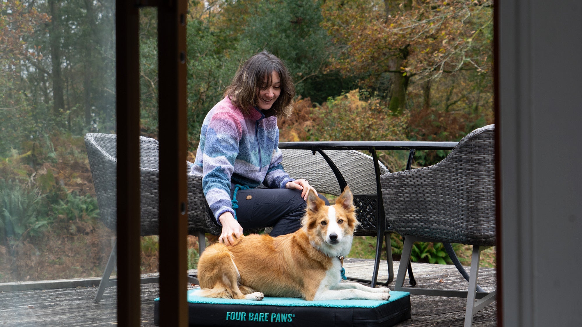 dog outside on sherpa Four Bare Paws bed